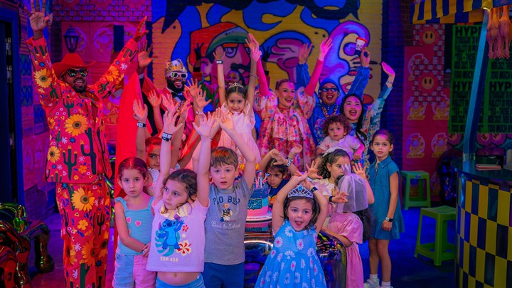 Children celebrating a birthday party with House of Hype characters